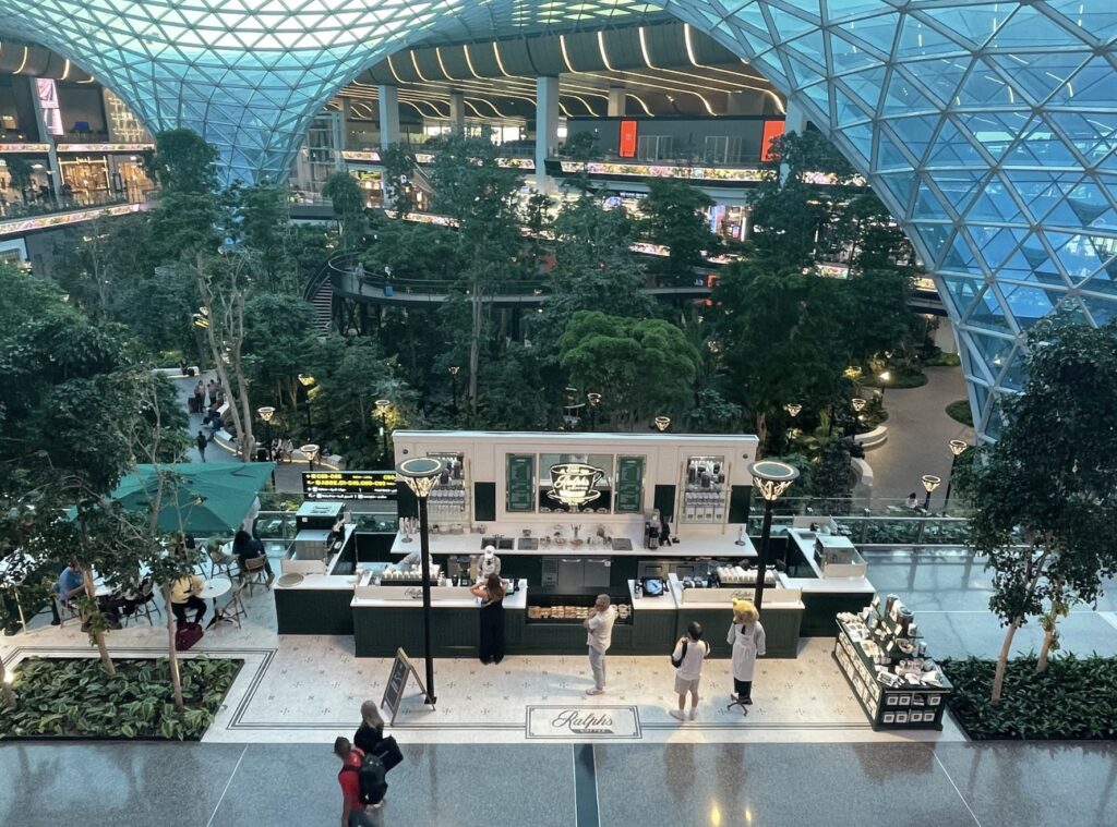 Shops and cafes around The Orchard at Hamad International Airport in Doha, Qatar