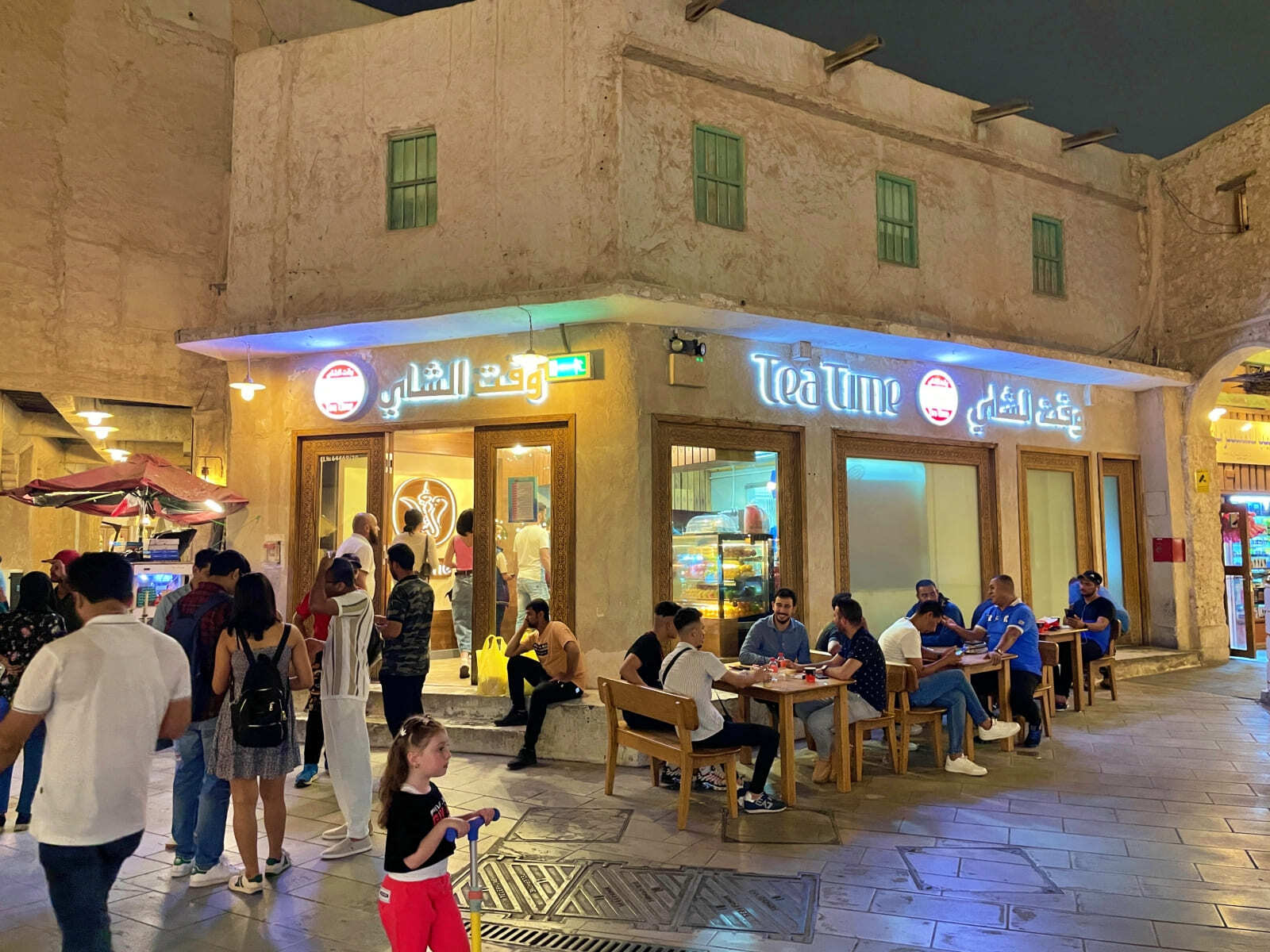 people waiting to enter Tea Time coffee in Souq Waqif, Doha, Qatar